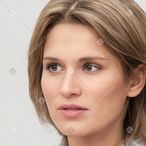 Neutral white young-adult female with medium  brown hair and grey eyes