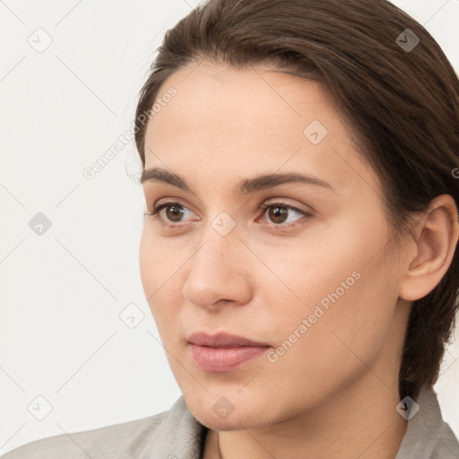 Neutral white young-adult female with medium  brown hair and brown eyes