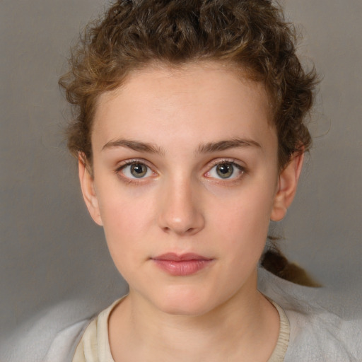 Neutral white young-adult female with short  brown hair and brown eyes