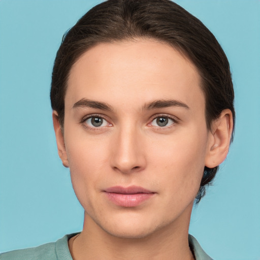 Neutral white young-adult female with short  brown hair and brown eyes