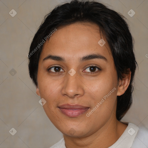 Joyful asian young-adult female with medium  brown hair and brown eyes