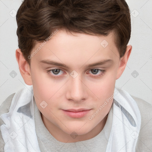 Joyful white child male with short  brown hair and brown eyes