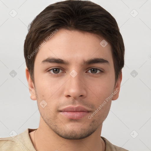 Neutral white young-adult male with short  brown hair and brown eyes