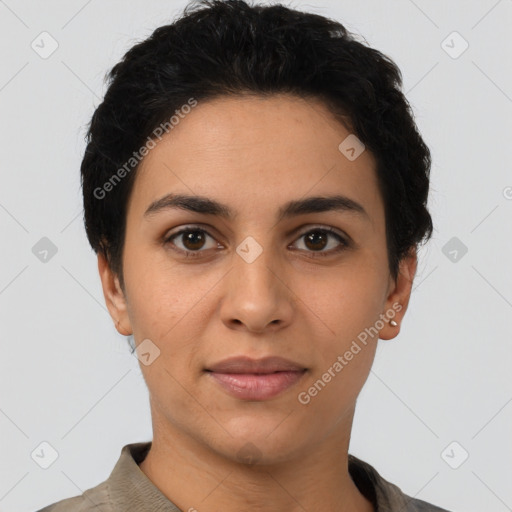 Joyful latino young-adult female with short  black hair and brown eyes