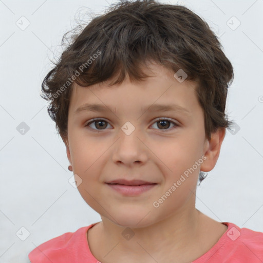 Joyful white child male with short  brown hair and brown eyes