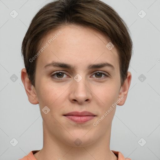 Joyful white young-adult female with short  brown hair and grey eyes