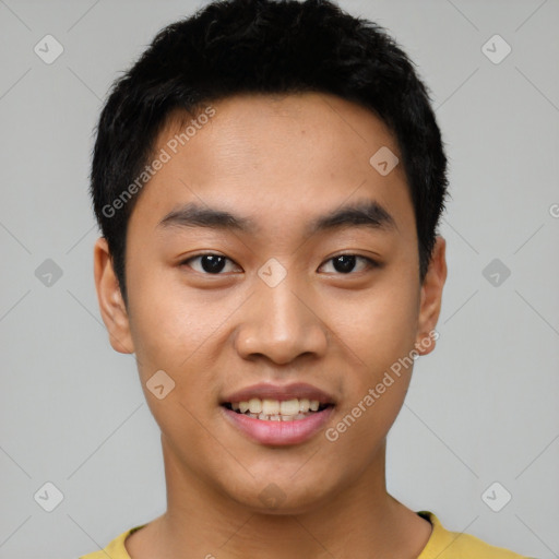 Joyful asian young-adult male with short  black hair and brown eyes