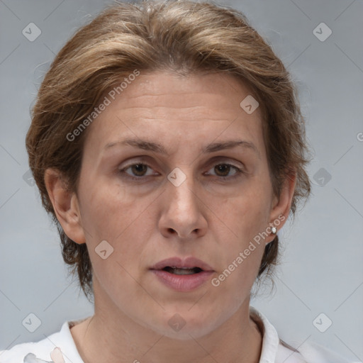 Joyful white adult female with medium  brown hair and brown eyes