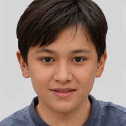 Joyful white child female with short  brown hair and brown eyes