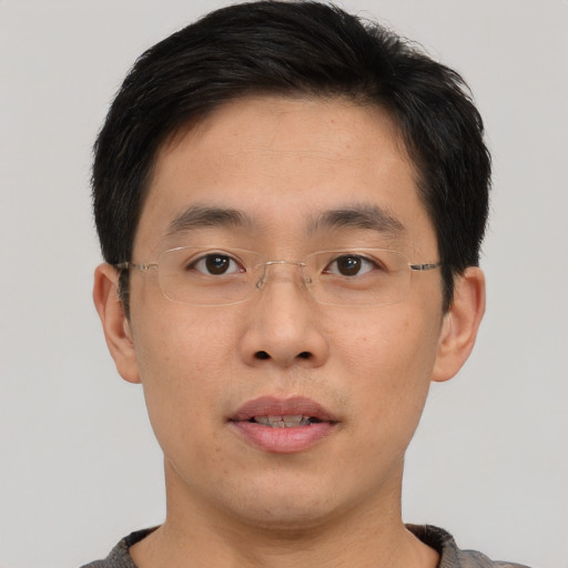 Neutral asian young-adult male with short  brown hair and brown eyes
