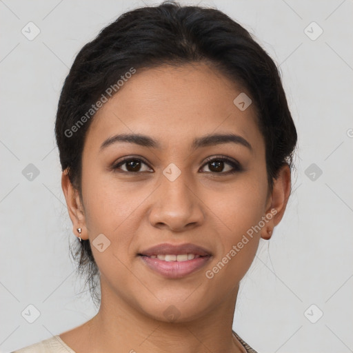 Joyful latino young-adult female with short  brown hair and brown eyes