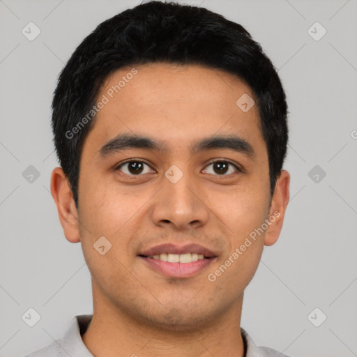 Joyful latino young-adult male with short  black hair and brown eyes