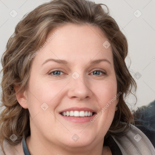 Joyful white young-adult female with medium  brown hair and blue eyes