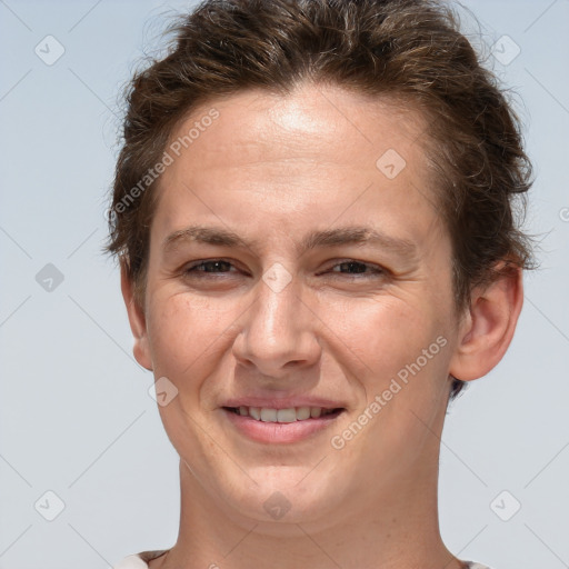 Joyful white adult female with short  brown hair and brown eyes