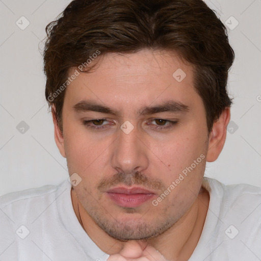 Neutral white young-adult male with short  brown hair and brown eyes