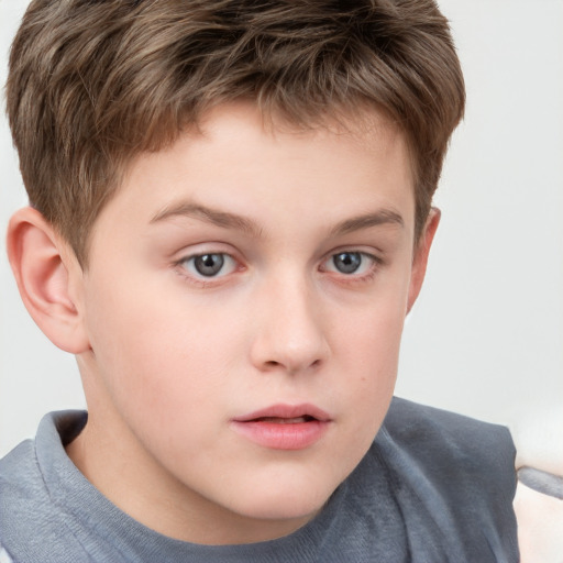 Neutral white child male with short  brown hair and grey eyes