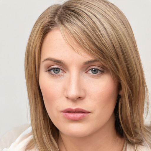 Neutral white young-adult female with medium  brown hair and grey eyes