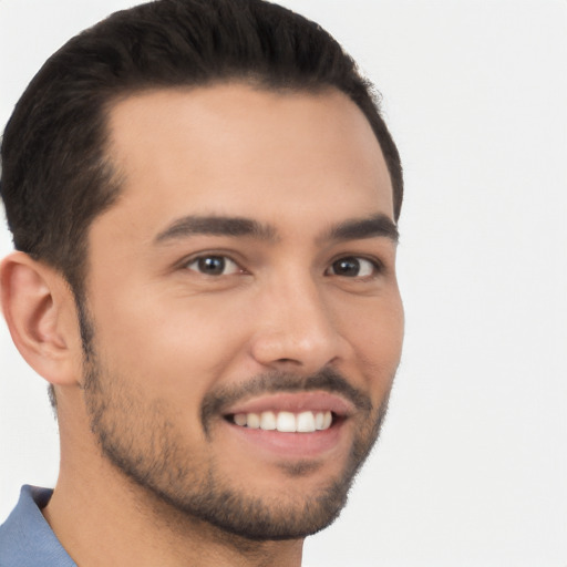 Joyful white young-adult male with short  black hair and brown eyes