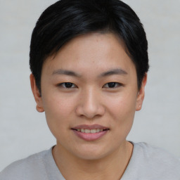 Joyful asian young-adult female with short  black hair and brown eyes