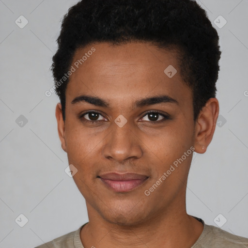 Joyful black young-adult male with short  black hair and brown eyes