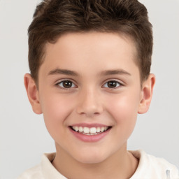 Joyful white child male with short  brown hair and brown eyes