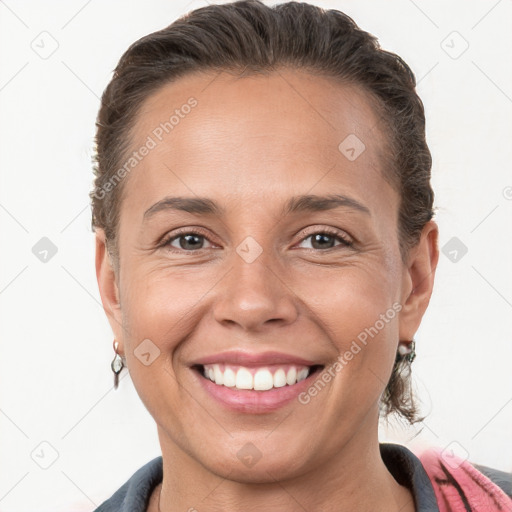 Joyful white young-adult female with short  brown hair and brown eyes