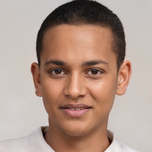 Joyful black young-adult male with short  brown hair and brown eyes