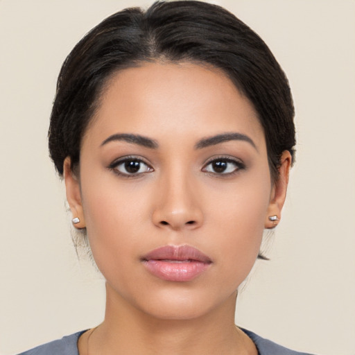 Neutral latino young-adult female with medium  black hair and brown eyes