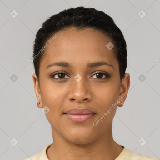 Joyful latino young-adult female with short  black hair and brown eyes