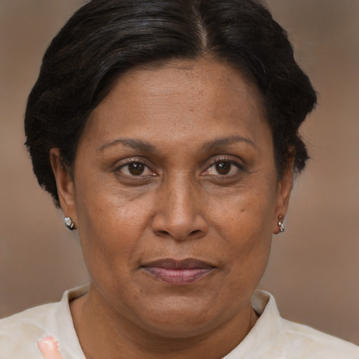 Joyful asian adult female with short  brown hair and brown eyes
