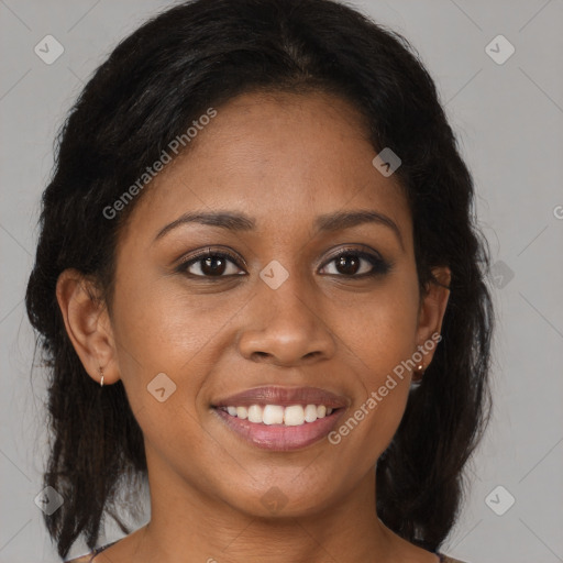 Joyful black young-adult female with medium  brown hair and brown eyes