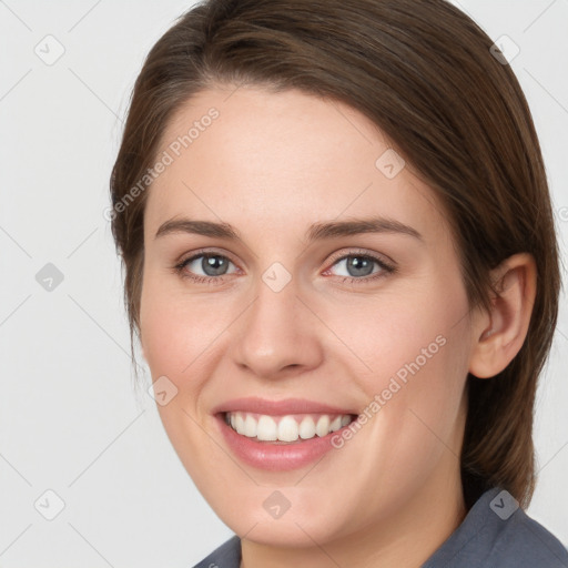 Joyful white young-adult female with medium  brown hair and blue eyes