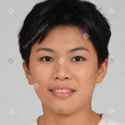 Joyful asian young-adult female with short  brown hair and brown eyes