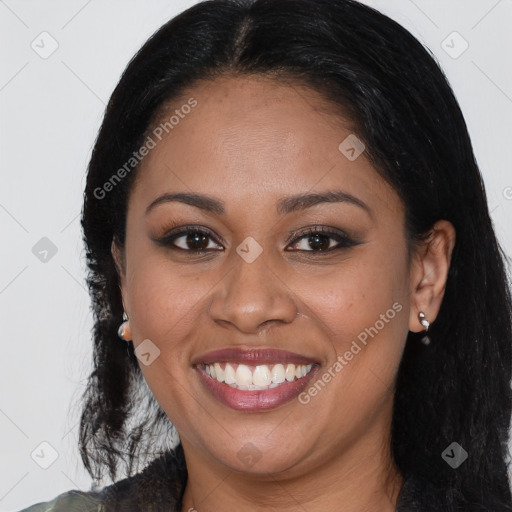 Joyful black young-adult female with long  brown hair and brown eyes