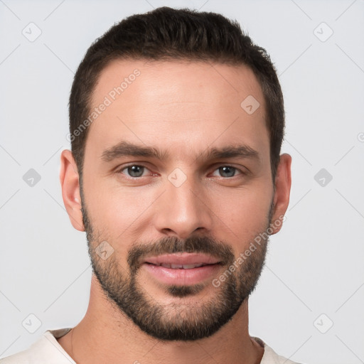 Joyful white young-adult male with short  brown hair and brown eyes