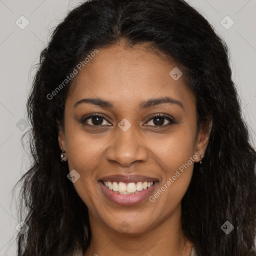 Joyful black young-adult female with long  brown hair and brown eyes