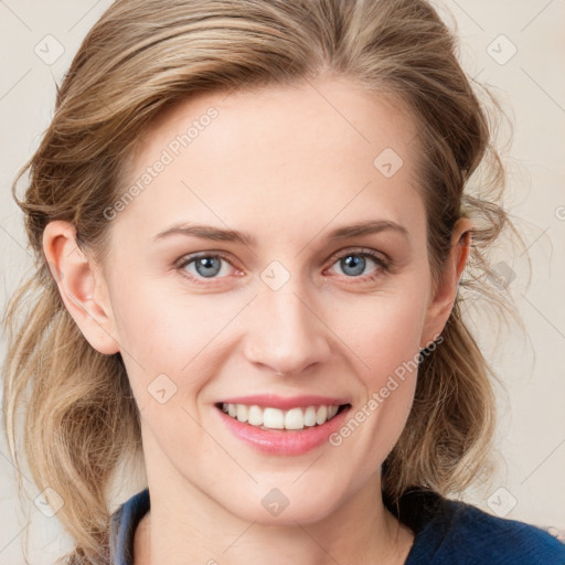 Joyful white young-adult female with medium  brown hair and blue eyes