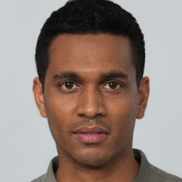 Neutral black young-adult male with short  black hair and brown eyes