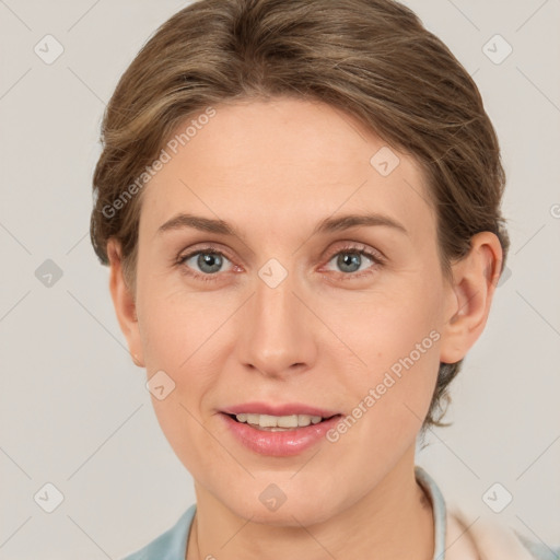 Joyful white young-adult female with short  brown hair and grey eyes