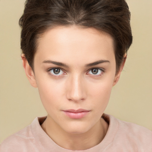 Neutral white young-adult female with short  brown hair and brown eyes