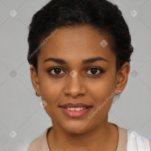 Joyful black young-adult female with short  brown hair and brown eyes