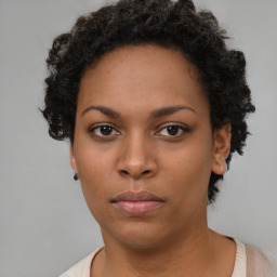 Neutral black young-adult female with short  brown hair and brown eyes