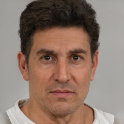 Neutral white adult male with short  brown hair and brown eyes