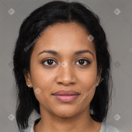 Joyful black young-adult female with medium  brown hair and brown eyes