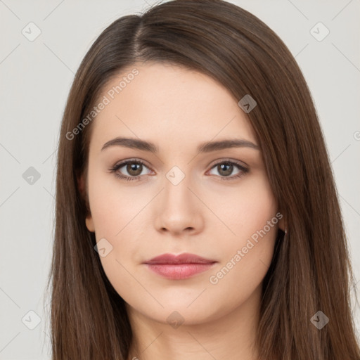 Neutral white young-adult female with long  brown hair and brown eyes