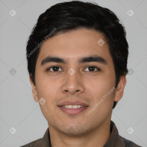 Joyful asian young-adult male with short  brown hair and brown eyes