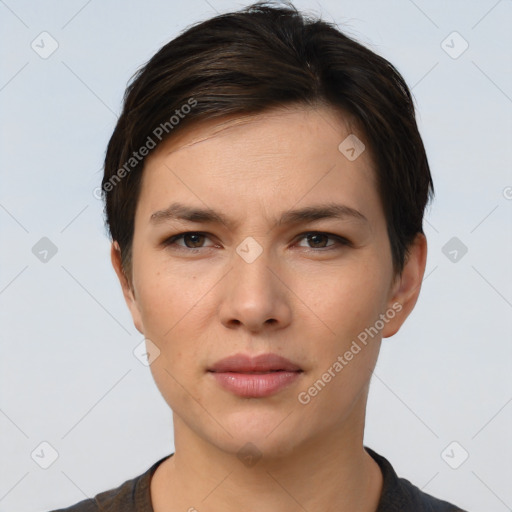 Neutral white young-adult female with short  brown hair and brown eyes