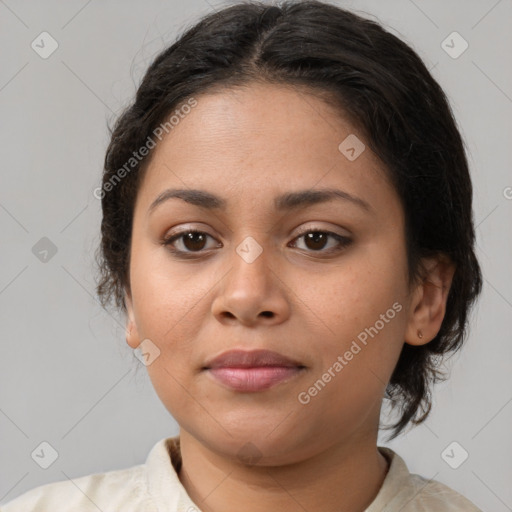 Joyful latino young-adult female with medium  brown hair and brown eyes