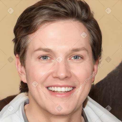 Joyful white adult female with medium  brown hair and grey eyes