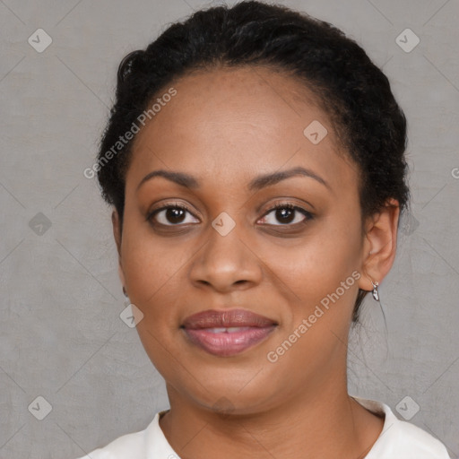 Joyful black young-adult female with medium  brown hair and brown eyes